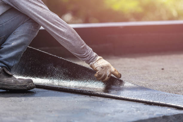 Professional Waterproofing technician working in Newburg, WI